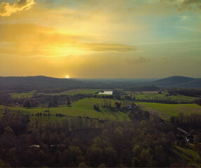 Fototapeta na wymiar Sunset over farm