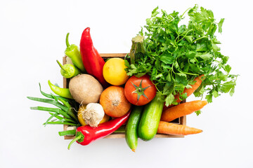 Fototapeta na wymiar Fresh Vegetables in basket on white isolated background top view. 