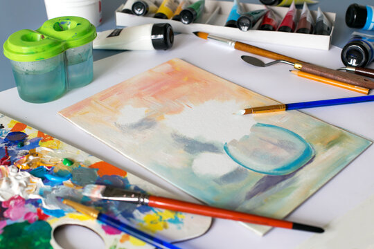 Acrylic painting. The process of painting with acrylic paints. The painter's tools and instruments. 