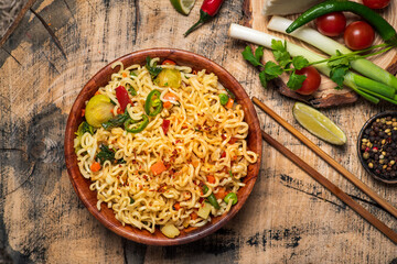 Asian instant noodles meal in a bowl - 428665823