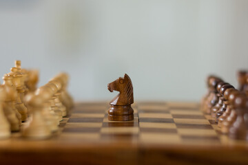 Shot of a chess board white horse moving. Business leader concept.