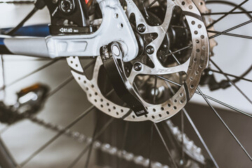 Fototapeta na wymiar Bicycle rear wheel quick release and disc brakes.
