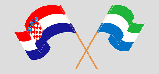 Crossed and waving flags of Croatia and Sierra Leone