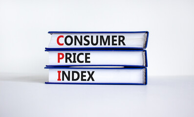 CPI, consumer price index symbol. Books with words 'CPI, consumer price index'. Beautiful white background, copy space. Business and CPI, consumer price index concept.