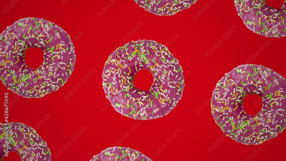 Poster pink donuts geometric pattern on a red background. simple motion graphic food concept seamless loop 