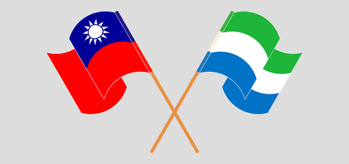 Crossed and waving flags of Taiwan and Sierra Leone