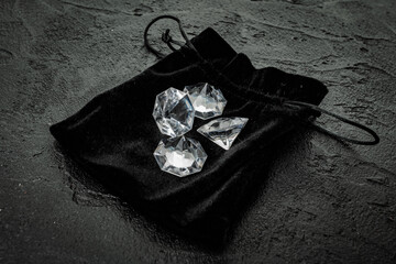 Diamond on black. Beautiful shining crystal