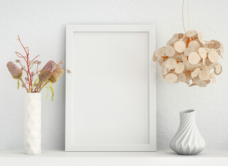 Mock up poster frame on white plaster wall with ceramic vase with flowers, lamp and geometric pot; stylish frame mock up portrait orientation; 3d rendering, 3d illustration