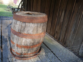 old wooden barrel on farmhouse porch