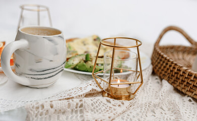 Candle on breakfast setup