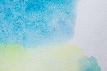 An abstract watercolor background on white paper