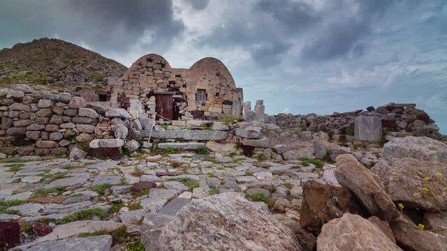 day time storm sky santorini island old stone house top panorama timelapse 4k greece