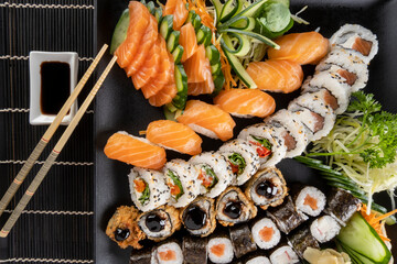  Mixed sushi roll and salmon sashimi