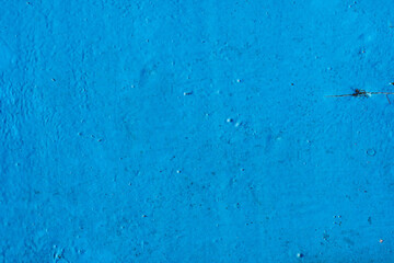 Background texture. Dusty old wooden surface painted with blue paint. Top view. Copy space