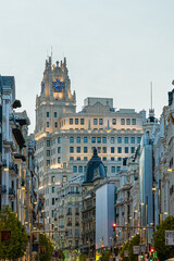 Photographs of the Telefónica building on Gran Vía street in Madrid in Spain during sunset