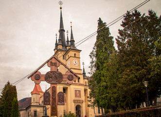 Orthodox wooden cross and Church