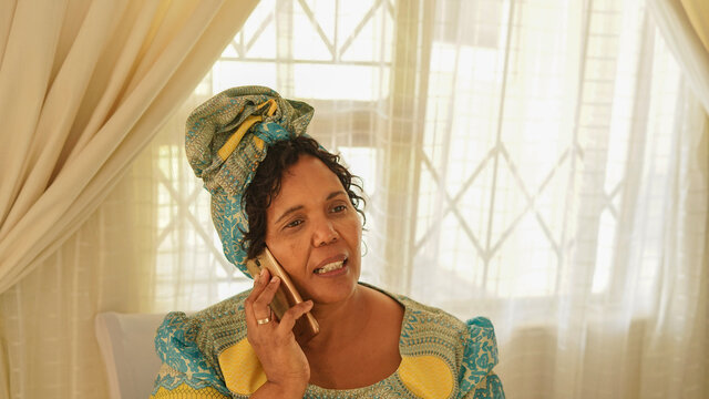 Elderly Black Woman Talking On The Phone