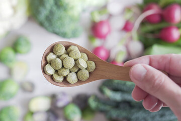 Naklejka na ściany i meble Cruciferous vegetables tablets, dietary fiber prebiotic supplements for healthy gut