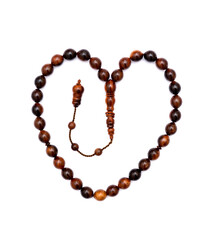 Muslim prayer rosary beads isolated on white background.