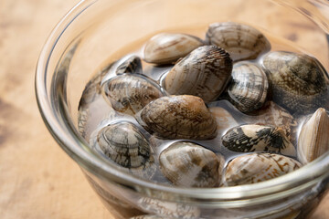 Asari clams in a glass bowl