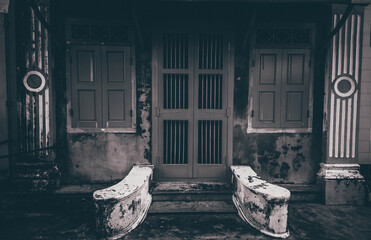 A black and white photo of an old building in Sino-Portuguese style at the old town of Phuket, Thailand