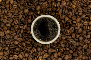 Coffee bean background, roast grain. Top view.