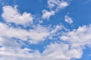 Beautiful white clouds on blue sky background.