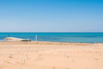 Beautiful landscape with white sand beach. Panoramic view on blue sky and azure coast sea on natural background. Luxury summer vacation