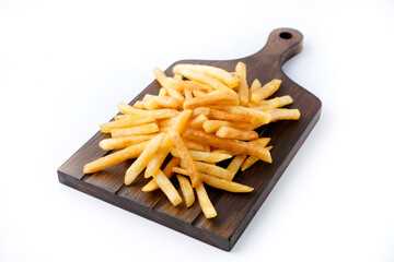 Close-up of homemade fried potatoes  on wooden board isolated on white. Copyspace