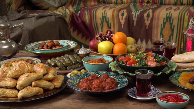 Arabic Cuisine: Middle Eastern Traditional Lunch On The Table. Iftar Food During Month Of Ramadan. The Meal Eaten By Fasting Muslims After Sunset. Moroccan Or Egyptian Oriental Restaurant 