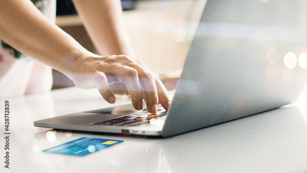 Aufkleber hands online shopping with credit card on laptop. raising of e commerce develop secure payment proce