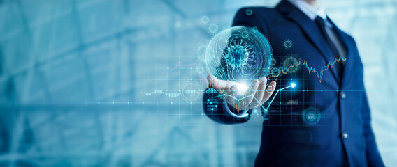 Businessman holding virtual coronavirus globe with stock market chart icons. Covid-19 pandemic effects to business financial struggling and impact on global economic crisis.