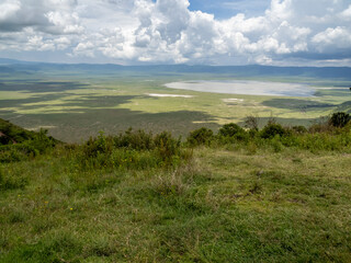 Fototapeta na wymiar Ngorongoro Crater, Tanzania, Africa - March 1, 2020: Scenic view of Ngorongoro Crater from above
