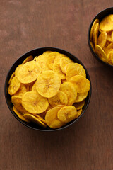 banana chips, popular Kerala snack deep fried in  coconut oil. traditional South Indian tea time snack on banana leaf, Kerala India on Onam, Vishu, Diwali, Ramzan