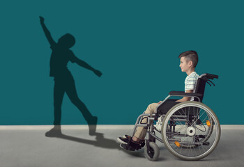 Boy in wheelchair dreaming about ability to walk at home