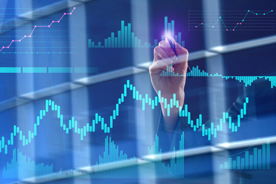 Young businesswoman using virtual screen on dark background. Concept of business planning