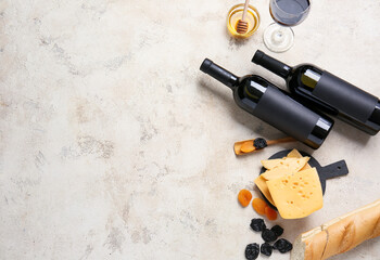 Composition with bottles of wine on grunge background