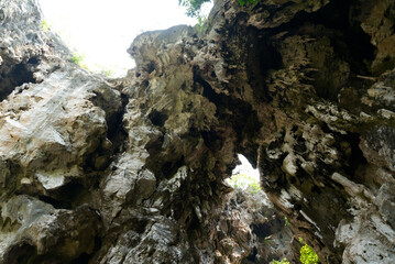 Light through a limestone mountain cave