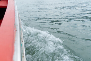 Sea waves from a passing boat