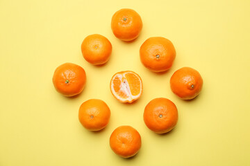 Sweet tangerines on color background