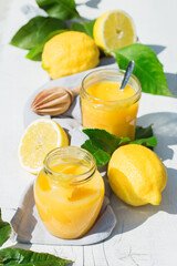 Homemade lemon curd, custard cream with yellow fruits