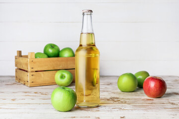 Bottle of apple cider on table