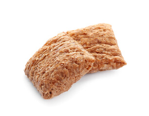 Tasty corn pillows on white background