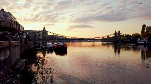London, England - October 09 2020: Motionlapse of the sunrise over the River Thames in Hammersmith, London