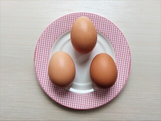 Eggs on a colorful plate. Easter eggs background