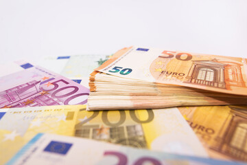 euro banknotes on white.