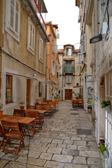 A narrow street in the historic center of Split, an ancient city in Croatia.