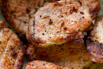 Sliced medium rare beef steak close-up. Delicious barbecue steak as a background. Close-up, texture of finished meat with mustard grains