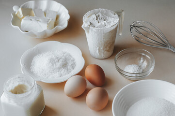 Culinary blog. Kitchen items on a beige background. Ingredients for the cake.