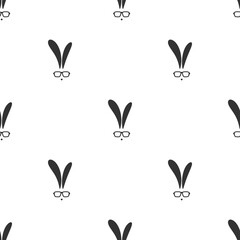 Seamless pattern with black flat hipster rabbit silhouette with glasses.